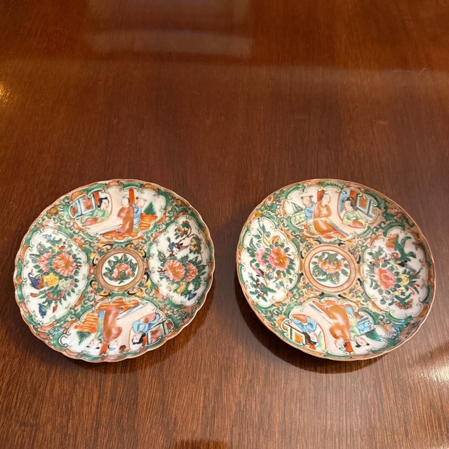 Circa 1840-1860 Scallop gilt rim Famille rose or rose medallion decorative plates. Hand painted with birds and butterflies...