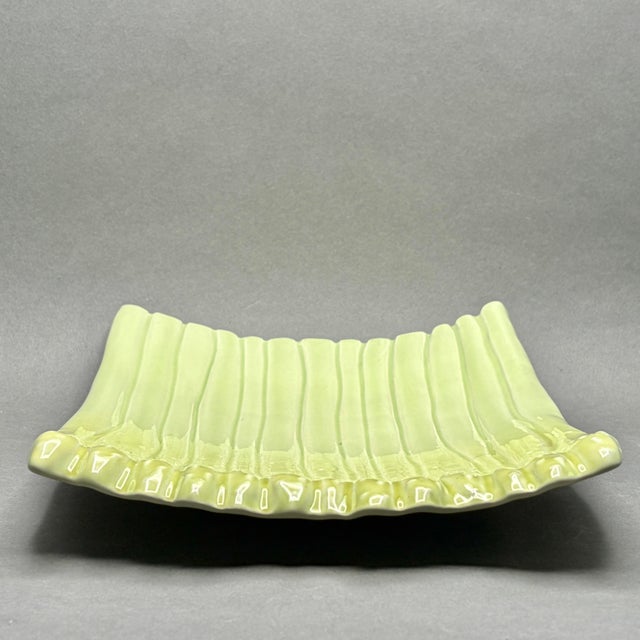This charming mid-century modern serving dish is masterfully crafted in the shape of a asparagus ears. It is a whimsical...