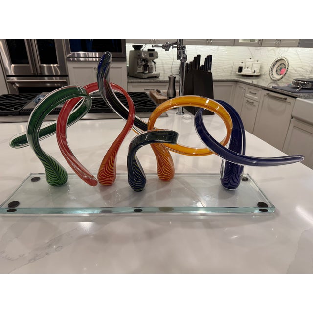 Scott Hartley is a master American glassblower and the founder of Infinity Art Glass, a widely recognized studio and...