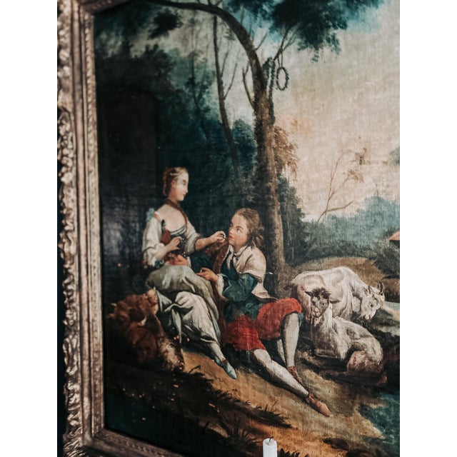 Antique oil painting with intricate gilded frame.