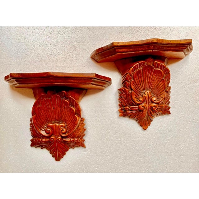 Rococo Pair of Vintage Mid-Century Hand-Carved Wooden Wall Shelves Features an Ornate, Deeply Detailed Scalloped Shell Design With a Rich, Warm Wood Finish. For Sale - Image 3 of 15