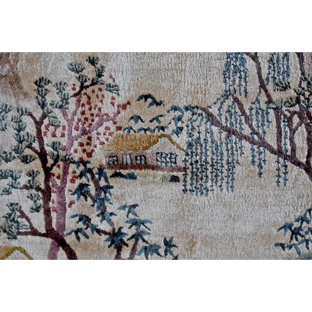 Hand-knotted picture rug made of genuine natural silk, originating from China, from Beijing production. The rug is made of...