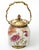 Offering a vintage Chinese porcelain Ginger Jar, Biscuit Jar or Tea Caddy with brass ormolu detailing, circa late 20th...