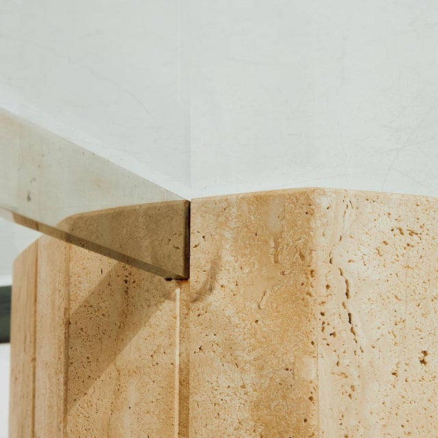 Italian limestone coffee table with octagonal glass top and chrome details from the 1970s. with some surface scratches and...