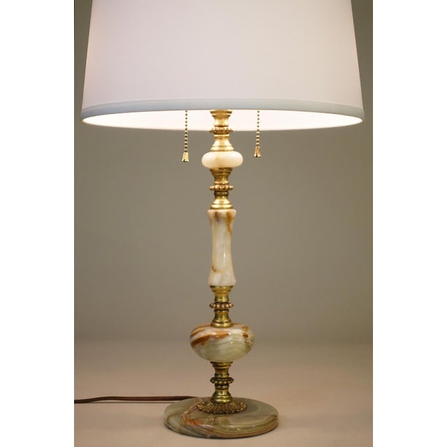 A sophisticated and elaborately detailed Green Banded Onyx Marble & Brass Art Nouveau Neo classic table lamp designed and...