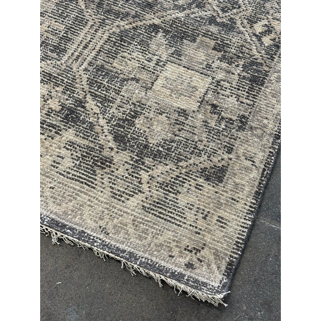 Design Plus Gallery presents a 12ft × 15ft Rejuvenation Elliott Hand-Knotted Rug. The Elliott collection showcases a...