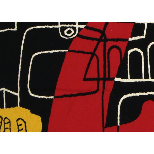 This recently woven Egyptian kilim offers a combination of tradition and elegance. Handcrafted from wool on cotton, the...