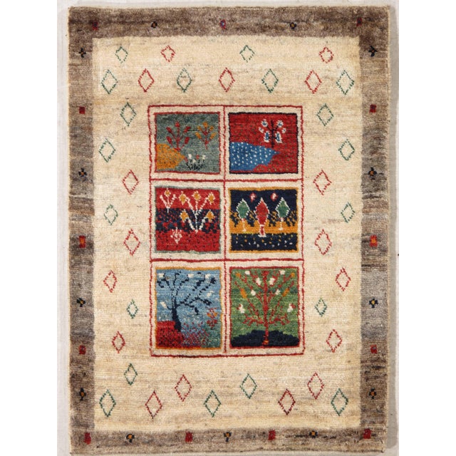 Hand-knotted Persian Gabbeh wool rug featuring six pictorial landscape panels arranged in a grid on an ivory field,...