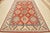 This traditional tribal geometric Caucasian Kazak rug is hand-knotted with an all-wool pile on a cotton foundation. This...