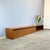 A unique lowboard in the minimalist style of 1960s Midcentury Modern. Despite its extra-wide width, the piece appears...