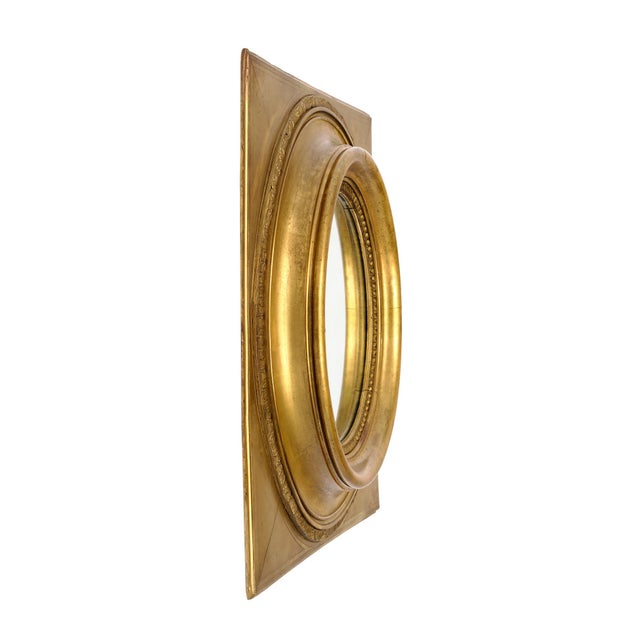 Mirror from France with w solid wood frame that features the original gold leafing throughout. The frame is square in...