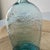 The Aqua Blue Union Clasped Hands Eagle Flask Bottle from the 1800’s is a unique antique collectible piece that stands out...