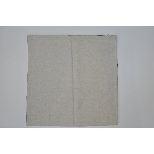 Make a statement with black and white geometric silk velvet accent pillow with bold stripes. A solid linen for the back...