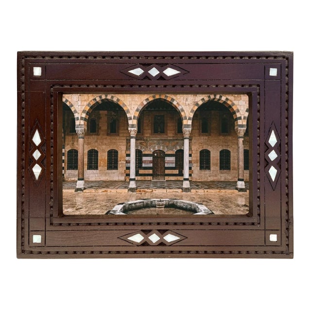 Small little hand carved with natural mother of pearl inlaid photo frame. The frame can be used vertical or horizontal,...