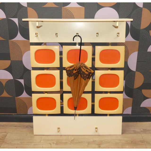 Decorative Highlight 70s Wardrobe in a Stunning Design with Orange Accents Nine decorative square elements in a stylish...
