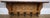 A charming Vintage French coat hanger featuring elegant carved detailing and a warm oak finish that adds character to any...