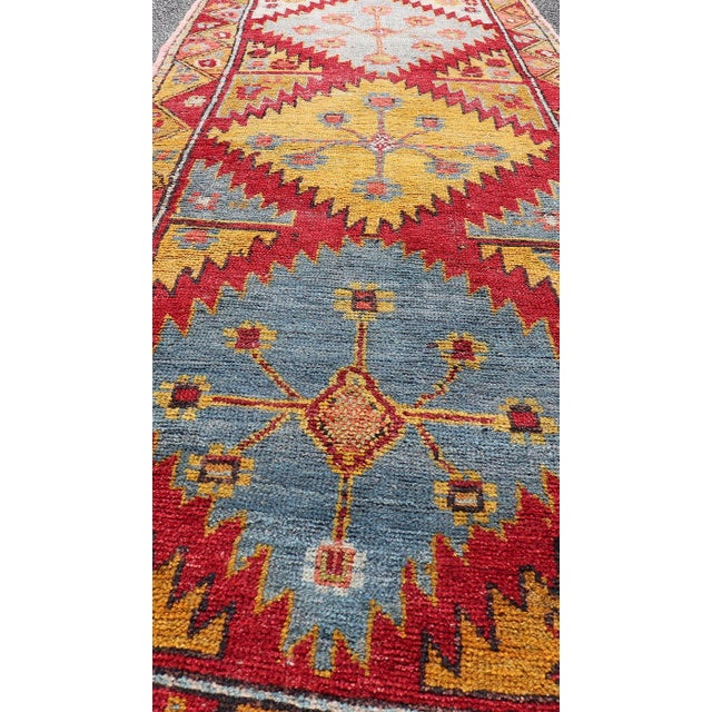 Vintage Turkish Oushak Runner With Bold Gold, Red, and Sky Blue Medallions For Sale - Image 11 of 13