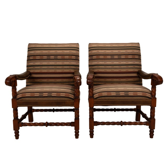Here is a gorgeous and unique pair of Hancock & Moore Throne Chairs. These chairs show hints of Louis XIII styling with...