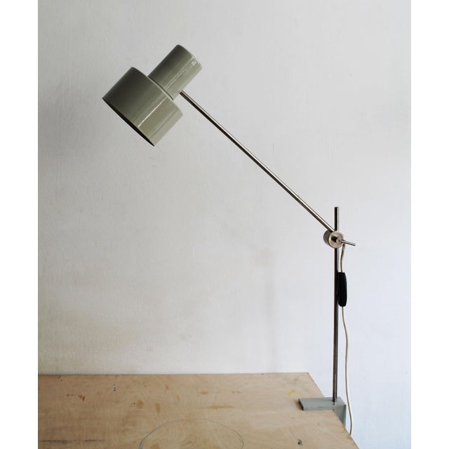 Designed in the 1960s by Slovak industrial designer Jan Suchan, this steel lamp represents a less common version of the...