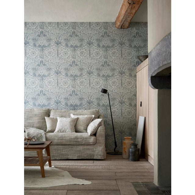 Elegant in design and colour this gravure printed wallpaper has been produced using mica and metallic effects and was...