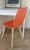 Scandinavian-style office chair, seat in thermally modified beech wood, orange in color (painted during renovation). Base...