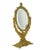A charming brass mirror adorned with delightful details. The design features cherubs, floral motifs, and a pair of lovers...