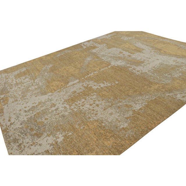 This contemporary 10x14 abstract rug is a bold new addition to the Homage Collection by Rug & Kilim. Hand-knotted in wool,...