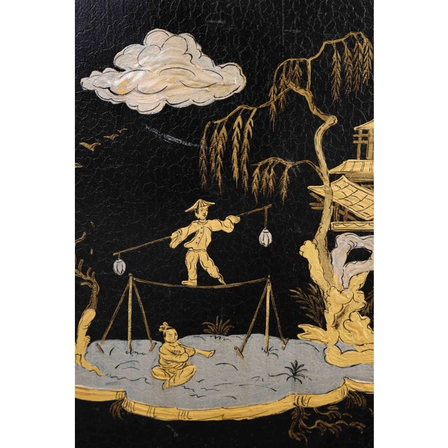 This Vintage wooden wall plaque features an acrobatic performer and a musician in gold color against a stylized oriental...