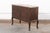 An elegant French Louis XV style commode, with richly figured burl veneers, original marble top and brass hardware, from...