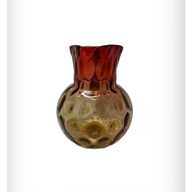 This beautiful Amberina pitcher was produced by either PhoenixGlass or possibly Hobbs Brockunier. The design is inverted...