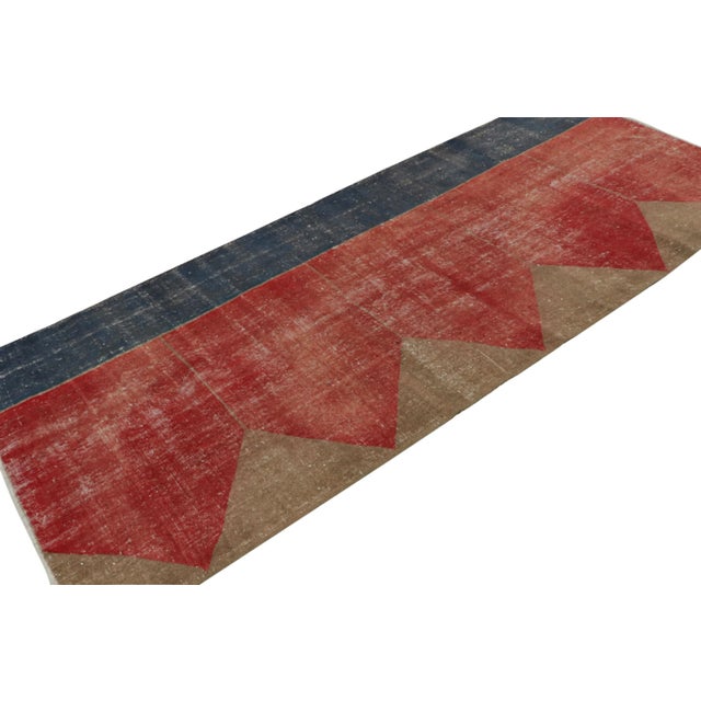 Hand Knotted in wool, this distressed vintage 4x10 Turkish rug, which is inspired by Saf rugs, a particular kind of prayer...