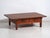 Antique Japanese low work table with side drawers, crafted in solid wood and dating to the early Showa period, circa...