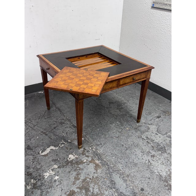 Design Plus Gallery presents a Chess/Backgammon Gaming Table likely from the Scarborough Collection for Maitland-Smith....