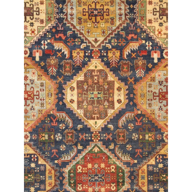Inspired by centuries of traditional rug-weaving artistry, this handcrafted rug features timeless patterns, rich colors,...