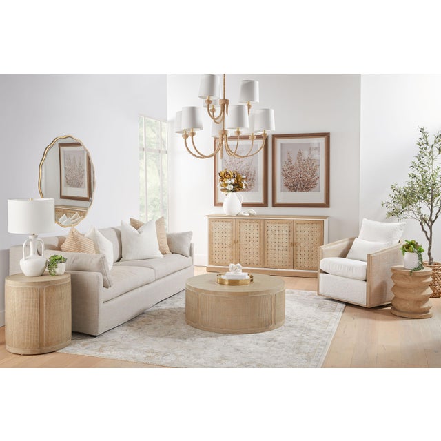 This round end table has an organic modern style. Its simple design has elements of modern charm, while the cane inlay...