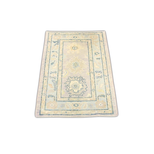Enhance your home décor with this stunning Handmade Turkish Oushak Oriental Rug, measuring 2'4" x 3'3". This exquisite rug...