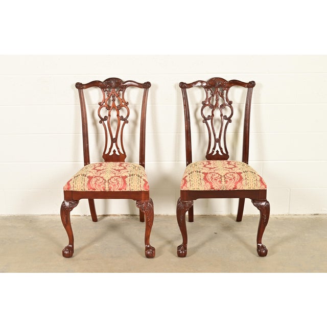 A gorgeous pair of Georgian or Chippendale style side chairs or dining chairs By Ethan Allen, "18th Century Mahogany"...