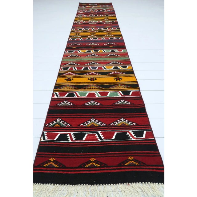 Beautiful vintage Turkish kilim runner rug made pure handspun wool and dyed naturally. Beautiful colours. this vintage...