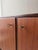 This spacious sideboard from the 1960s stands out due to the serene proportion between the long cabinet body and the...
