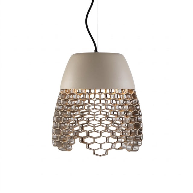 Handmade in the Philippines by Schema for Oggetti, the High Boy Pendant Light brings an expressive, architectural presence...