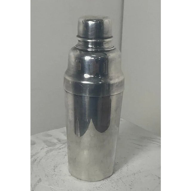 Christofle stepped Art Deco martini shaker, a rare model in restored condition. The comfortable size might require a...