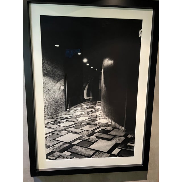 Large Shadid Datawala Photograph Ghost like image in curving hall. Black & White Museum Framing - Black Wood Frame with...
