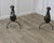 A Pair of French Gothic Iron Andirons or Fire Dogs This is a Heavy pair of Antique Andirons, they are made in iron, and...