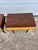 Elegant pair of Mid-Century Modern nightstands featuring beautifully figured wood veneers with contrasting light wood...