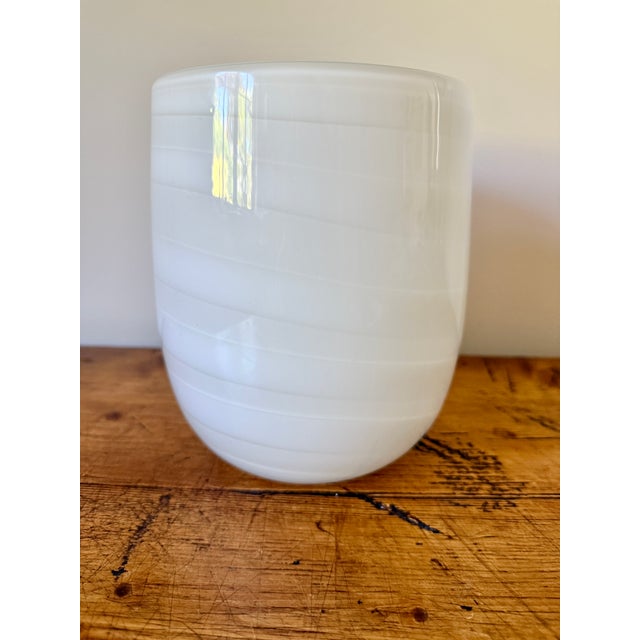 Beautiful White & Cream Vase in a Swirled Design. The pontil mark is polished and slightly indented. 6" wide at center of...