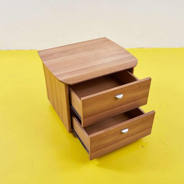 Discover our elegant birch wood nightstand, a perfect example of contemporary design with vintage influences. This piece,...