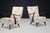 Pair of Italian Art Deco sculptural walnut armchairs from the 1930s, retaining their original floral upholstery in...