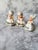 This is a set of vintage miniature Christmas angels figurines playing instruments. Napco is the National Potteries...