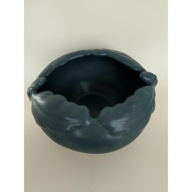 The Vintage Van Briggle Pottery Bowl is a stunning piece crafted by the renowned Van Briggle pottery brand. This bowl...
