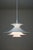 This white Radius pendant was designed by Erik Baslev for Fog and Mørup. This piece has an attribution mark, I am sure...